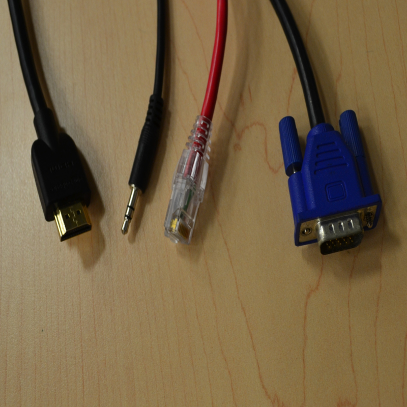 An HDMI, 3.5mm Audio, JR45 Ethernet, and VGA cables